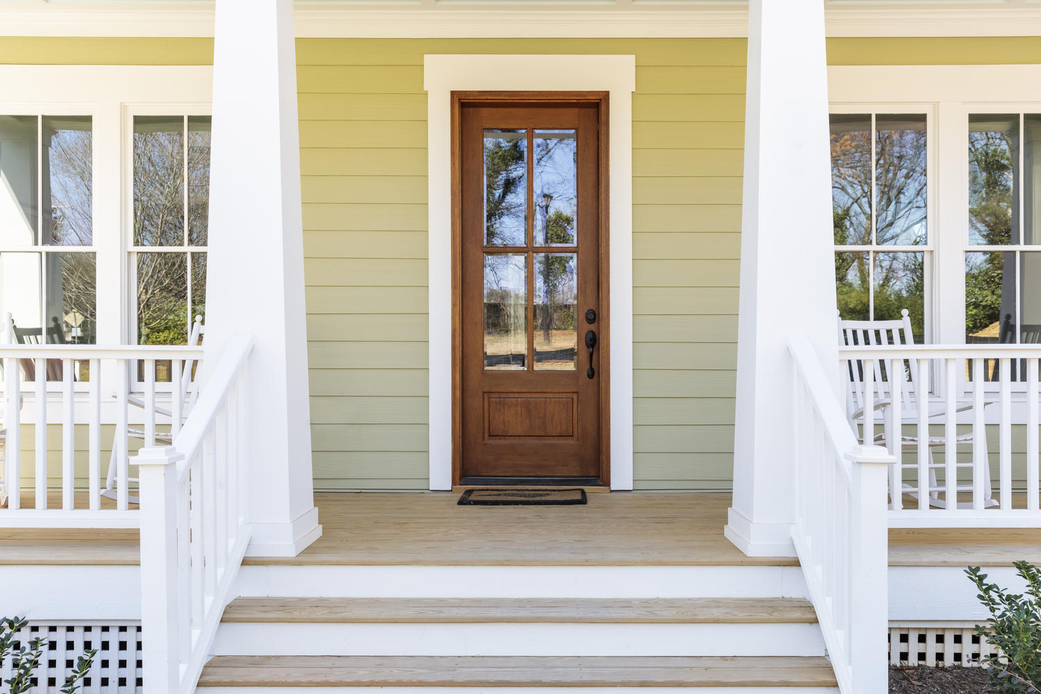 Front,Door,,Front,View,An,Inviting,House,With,A,Porch